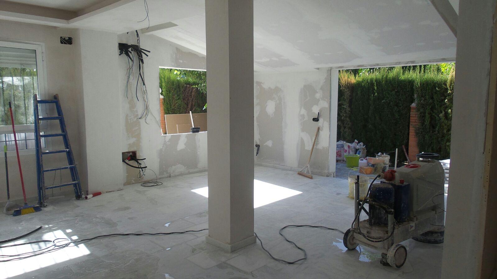 Una mirada hacia el jardín | Proyecto de integración de patio en salón y reforma de patio 28 residencial-montequinto-sevilla-exterior-obra-01