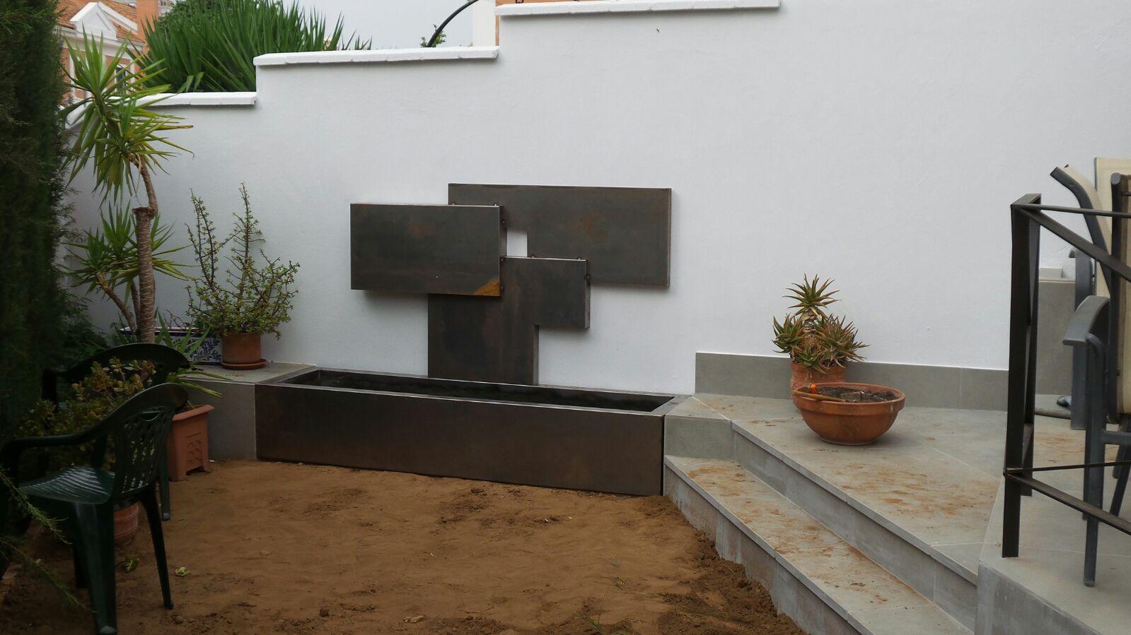 Una mirada hacia el jardín | Proyecto de integración de patio en salón y reforma de patio 29 residencial-montequinto-sevilla-exterior-obra-02