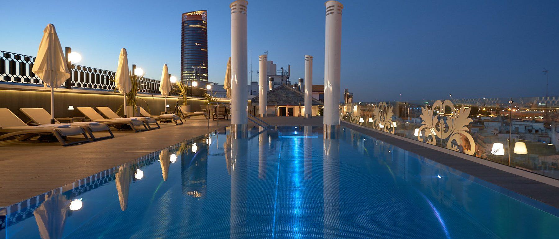 Hoteles 11 Interiorismo para la terraza piscina del hotel Monte Triana de Sevilla